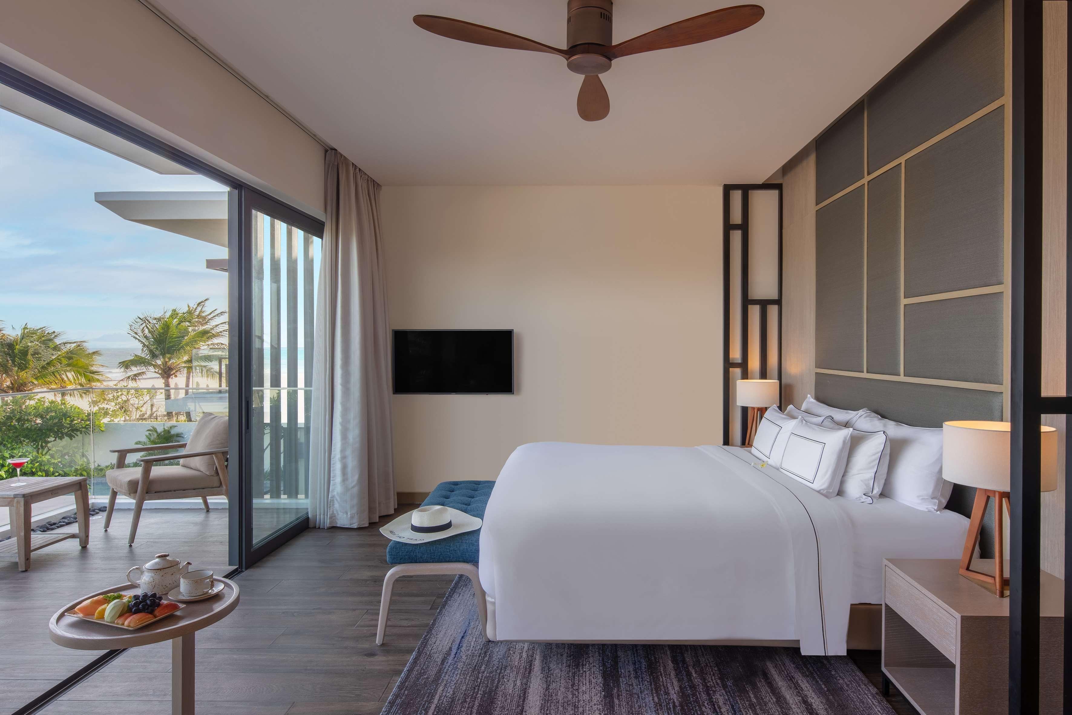 Melia Ho Tram Beach Resort Dış mekan fotoğraf A bedroom at the hotel