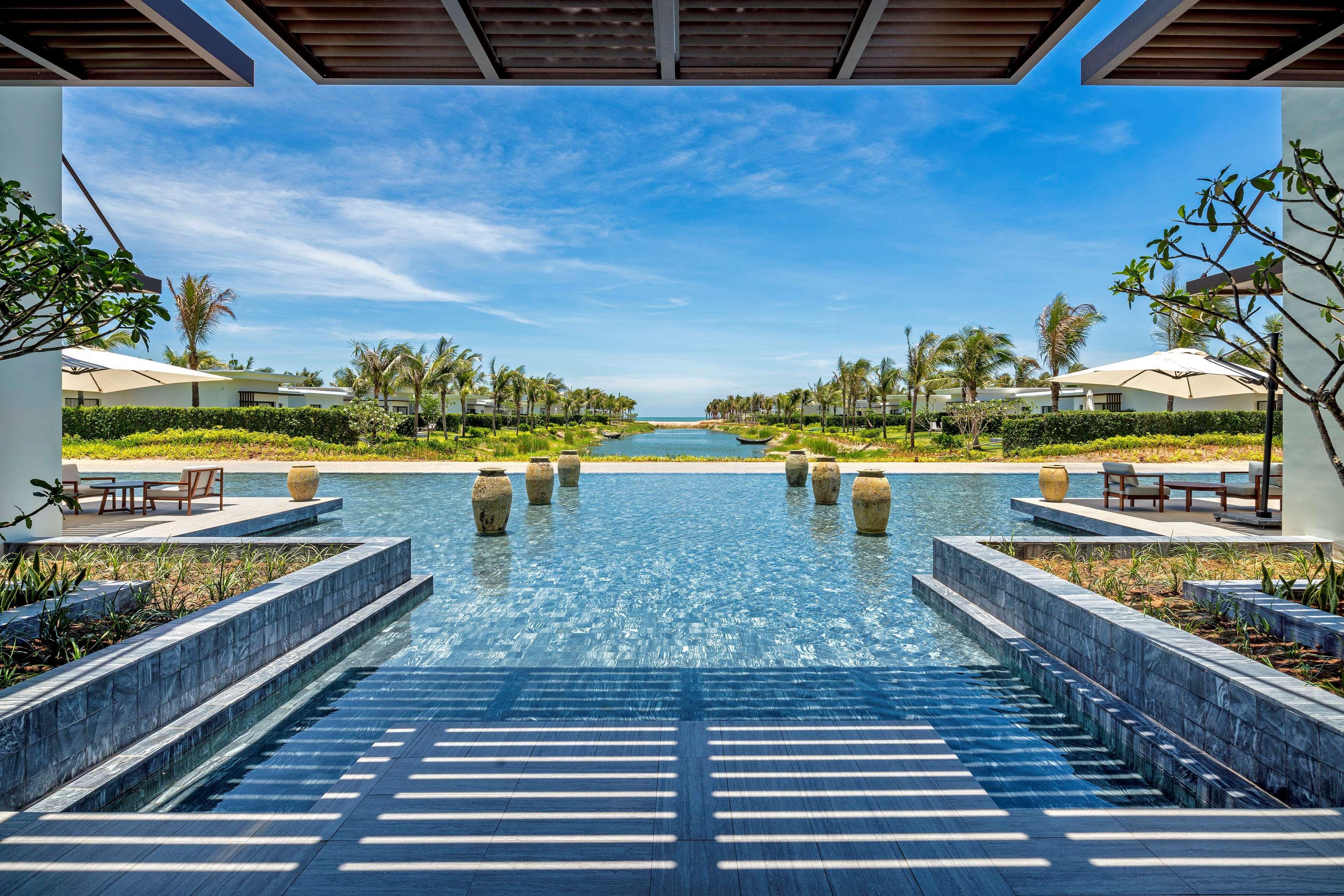 Melia Ho Tram Beach Resort Dış mekan fotoğraf The pool at the Sheraton Nha Trang Hotel & Spa Resort